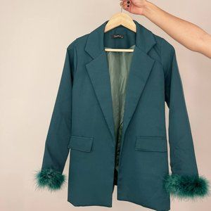 Green costume with feathers